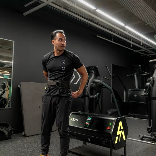 Athlete modeling a workout machine from Aris Performance, captured by MJS Live Productions.