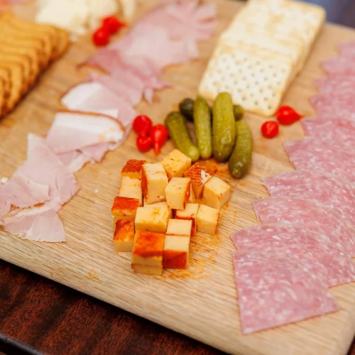 Rustic charcuterie board and multiple pairing options, photographed for a dining promotion.