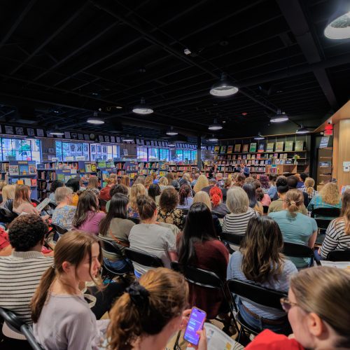 Large bookstore crowd captured during community event photography by MJS Live Productions