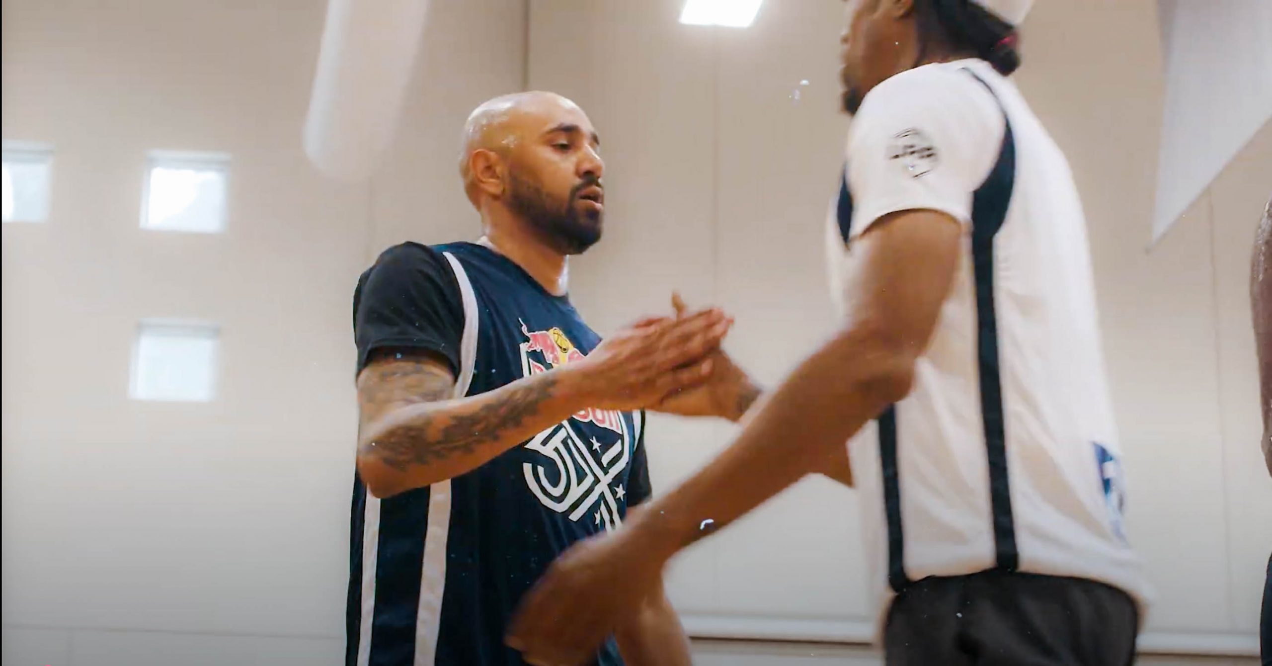 Pre-game handshake photo from basketball event filmed by MJS Live Productions
