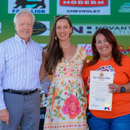 MJS Live Productions photographing the Mayor and First Lady of Winston-Salem presenting a proclamation during the Hispanic League Festival in downtown Winston-Salem, North Carolina