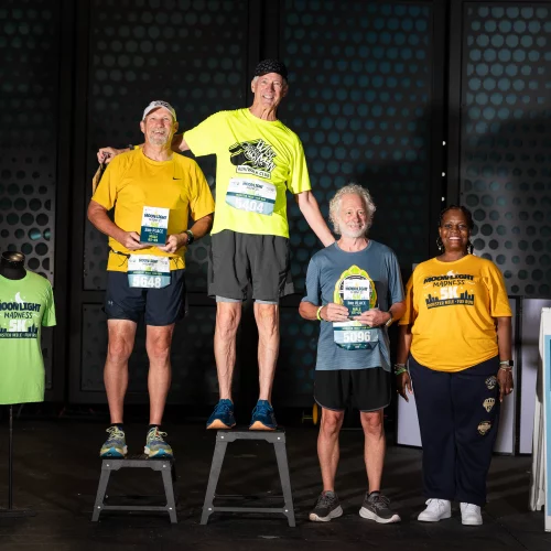 MJS Live Productions photographing race winners at the Moonlight Madness 5K event in Winston-Salem, North Carolina